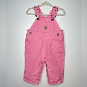 Baby girl’s pink overalls with snaps for easy diaper changing access in size 6M
